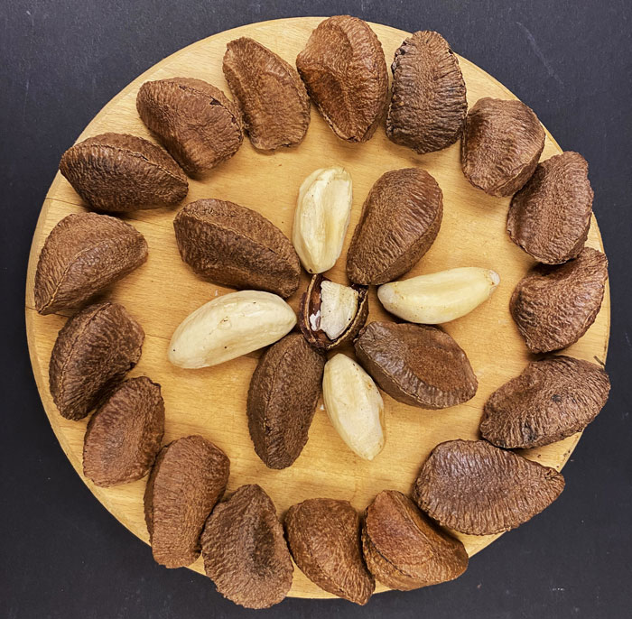 circle board with display of shelled and unshelled nuts