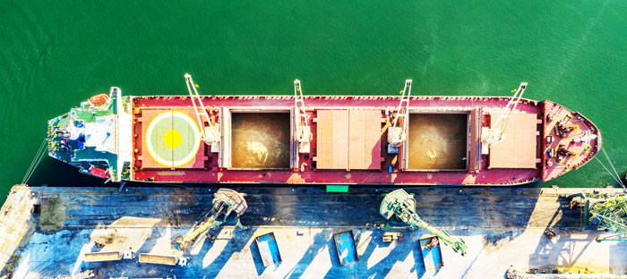 aerial view of grain container ship at port