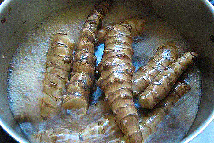 tubers in a pan of water